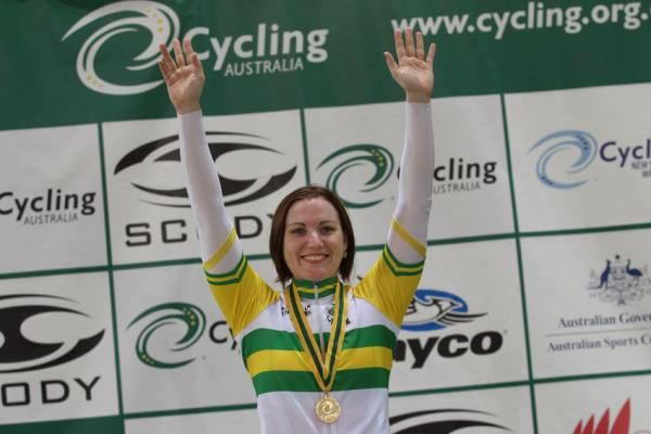 Anna Meares stands victorious on the top of the podium after taking out the women's keirin.