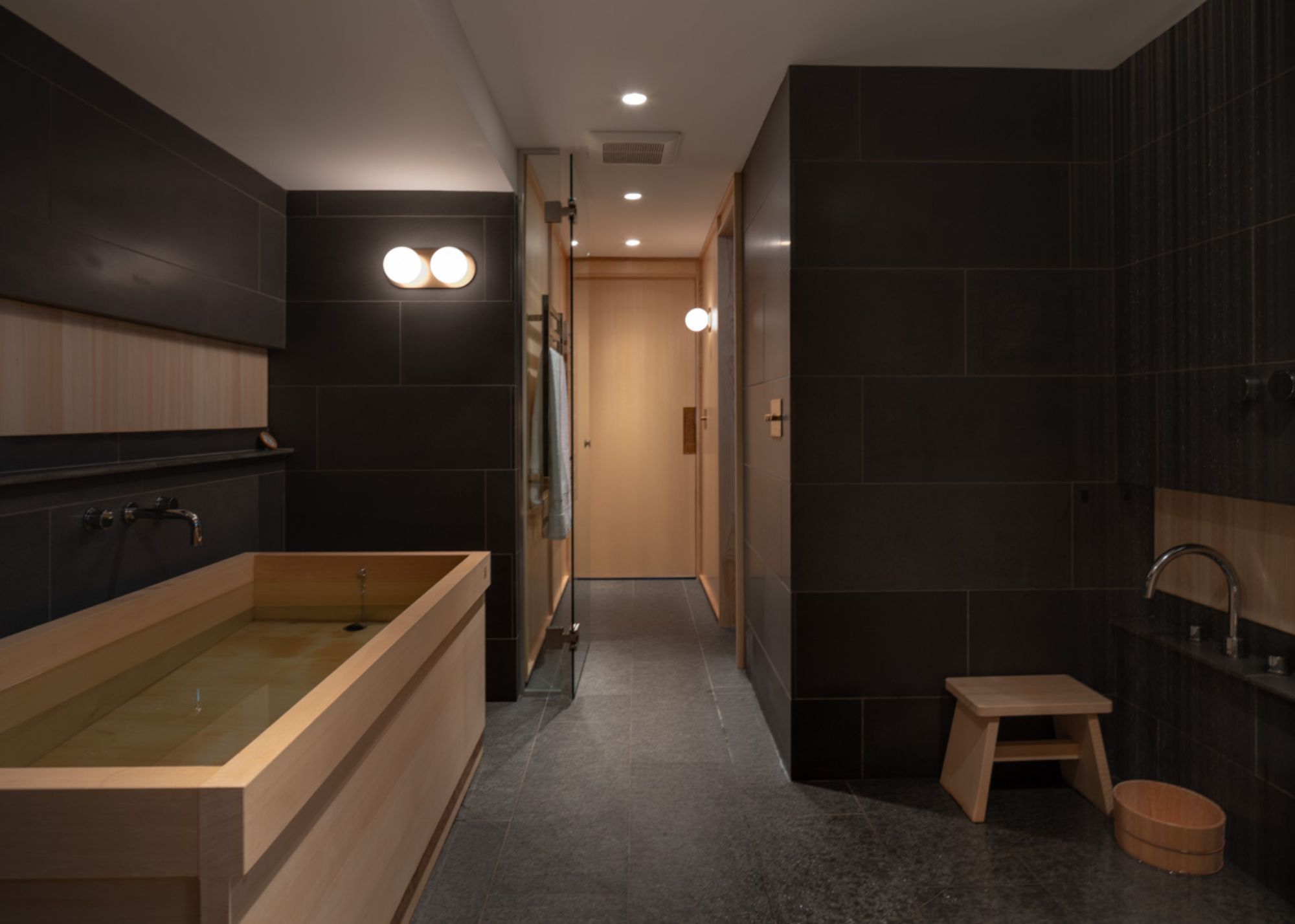 A Japanese-inspired bathroom with a soaking tub