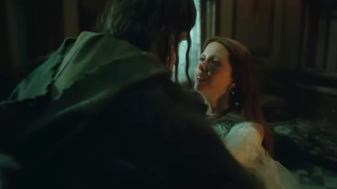 Mia Goth looking longingly at Jacob Elordi.