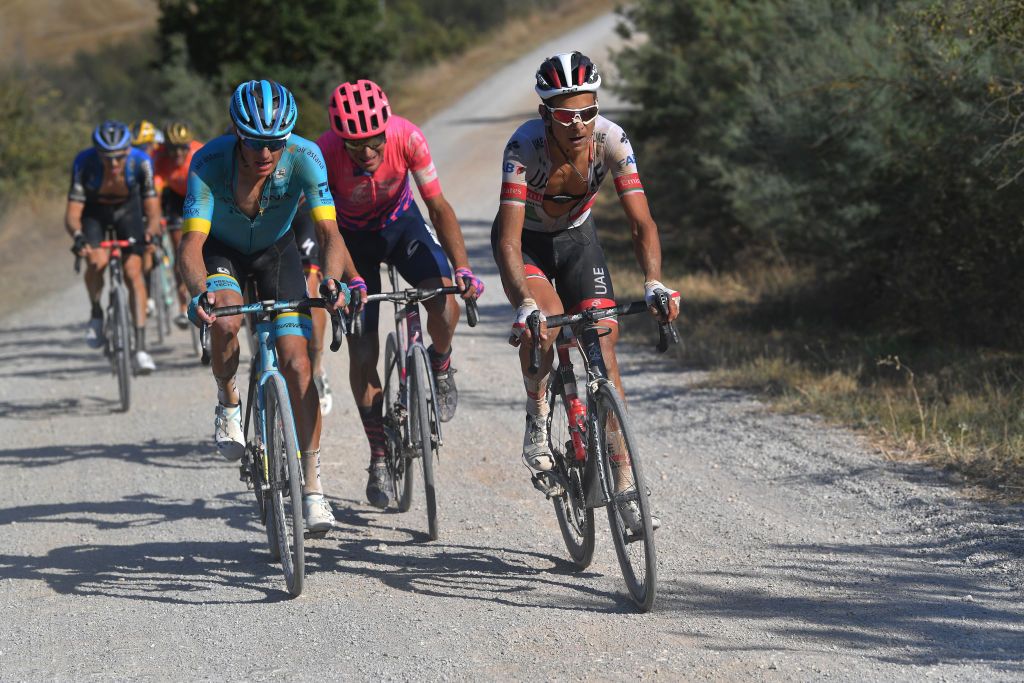 SIENA ITALY AUGUST 01 Jakob Fuglsang of Denmark and Astana Pro Team Alberto Bettiol of Italy and Team EF Pro Cycling Davide Formolo of Italy and UAE Team Emirates during the Eroica 14th Strade Bianche 2020 Men a 184km race from Siena to SienaPiazza del Campo StradeBianche on August 01 2020 in Siena Italy Photo by Tim de WaeleGetty Images