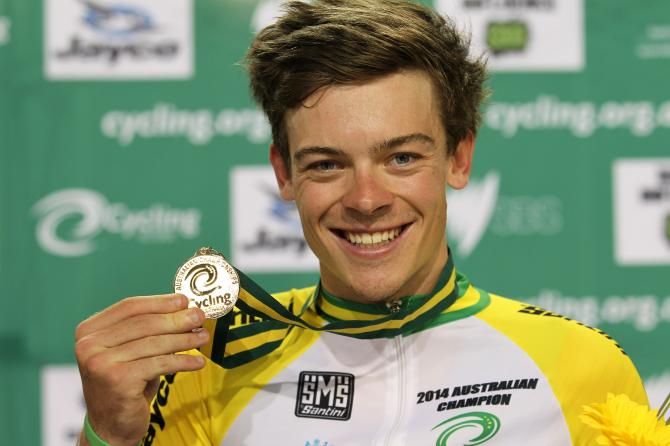Alex Edmonson celebrating with gold in the Omnium