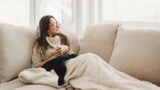 woman relaxing on sofa