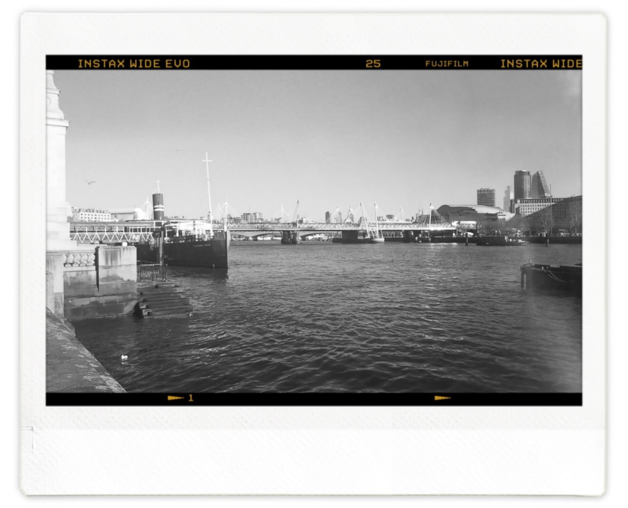 View across the River Thames with a film border