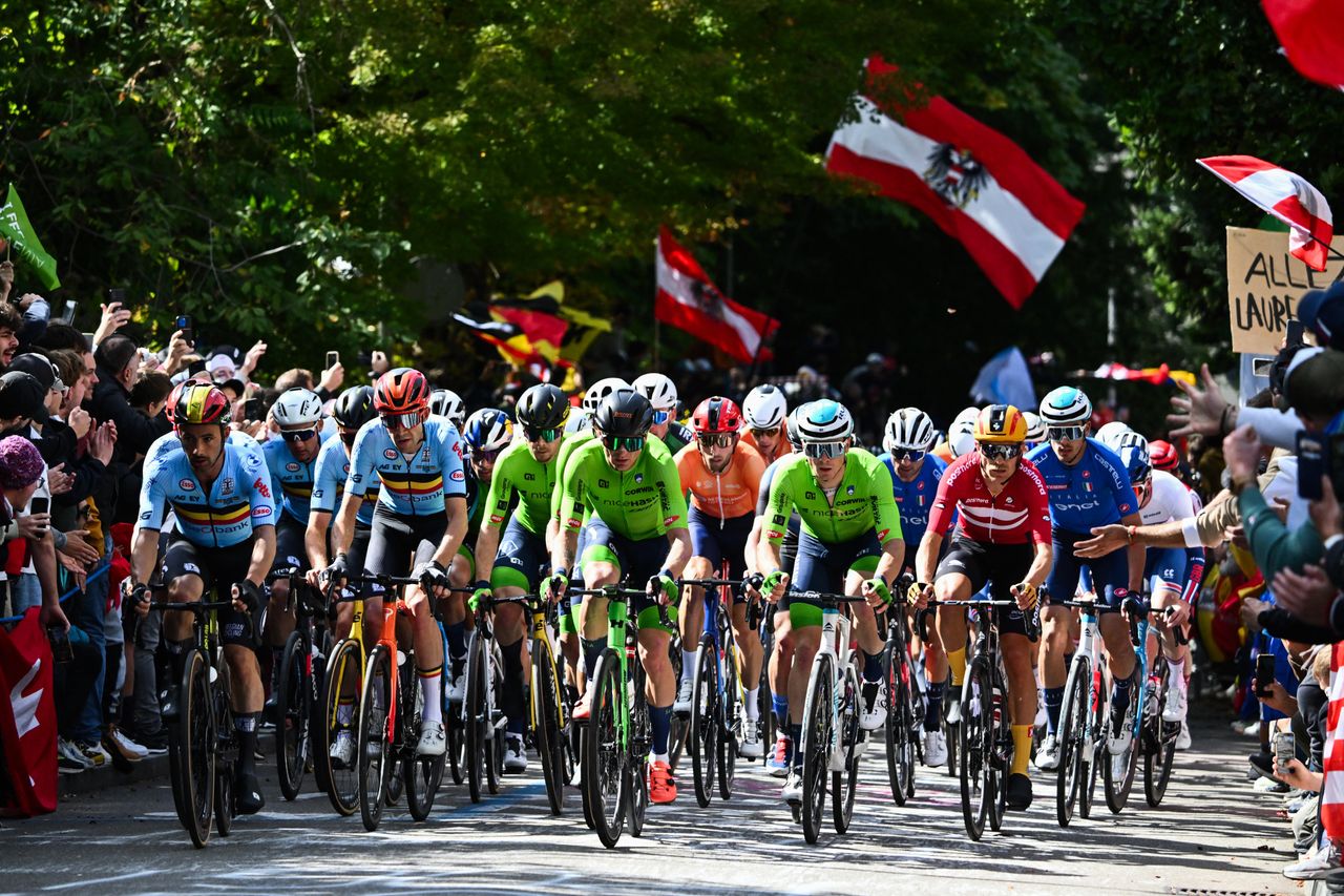A general view of the peloton competing while fans cheers during the 97th UCI Cycling World Championships Zurich 2024 Men&#039;s Elite Road Race