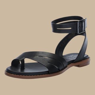 flat lay of black sandal