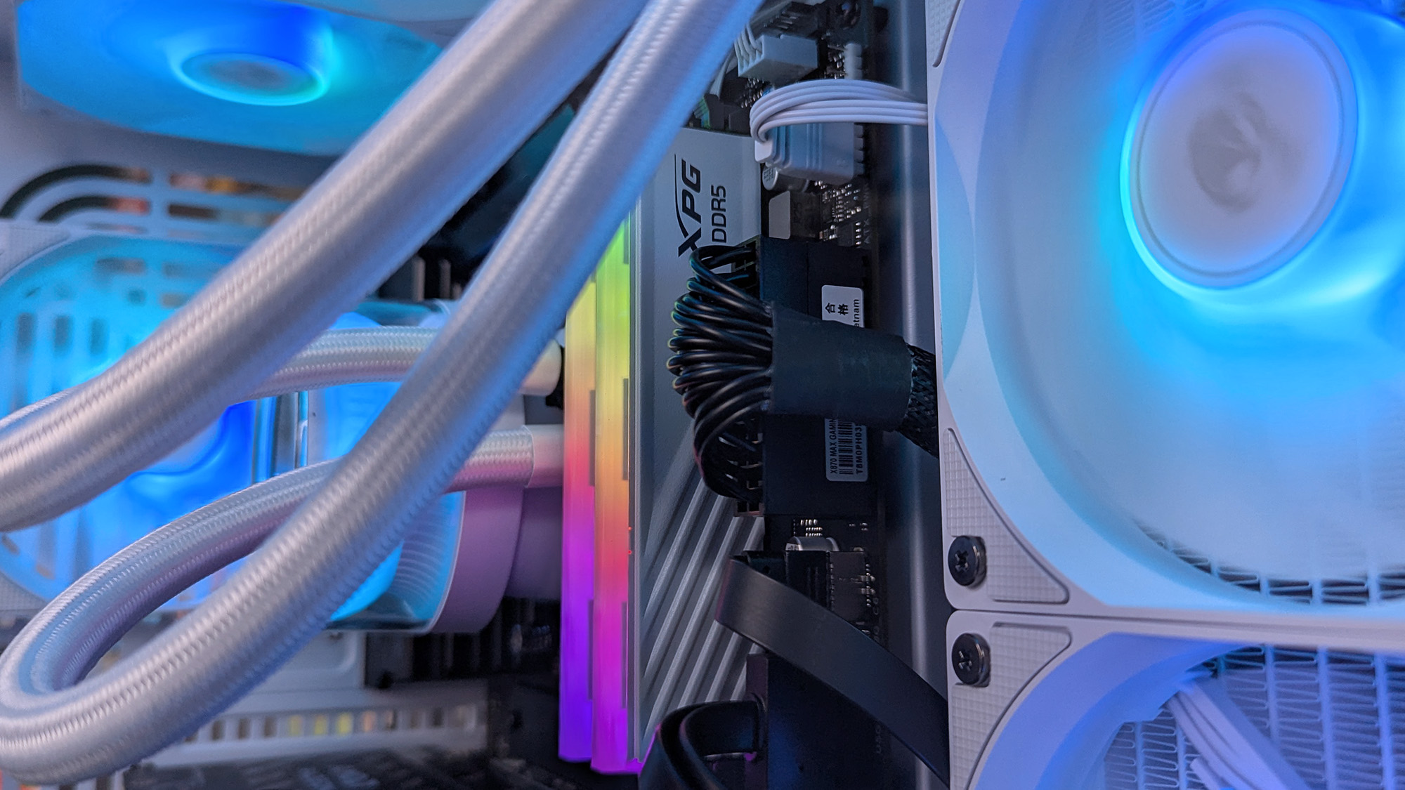 iBUYPOWER RDY Trace X R01 pre-built gaming PC in a white case highlighting RGB memory installed inside