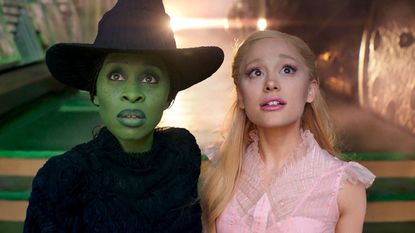 Elphaba and Glinda looking at something magical off-camera in Universal's Wicked Part One movie