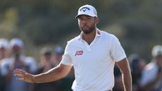 Sam Burns acknowledges the crowd at The Open
