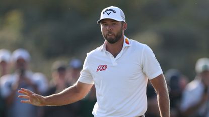 Sam Burns acknowledges the crowd at The Open