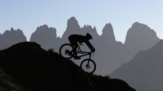 Mountain biker in the Dolomites, Italy