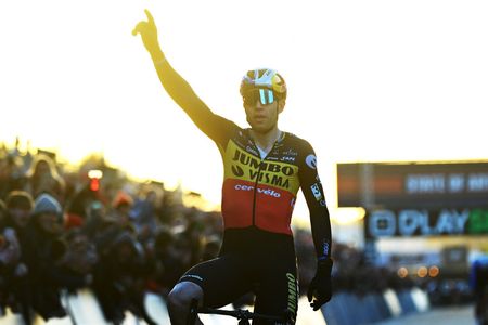 ZOLDER BELGIUM DECEMBER 27 Wout Van Aert of Belgium and Team JumboVisma celebrates at finish line as race winner ahead of Mathieu Van Der Poel of The Netherlands and Team AlpecinDeceuninck during the 18th Superprestige HeusdenZolder 2022 Mens Elite Superprestige2023 on December 27 2022 in Zolder Belgium Photo by Luc ClaessenGetty Images