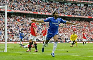 Didier Drogba celebrates after scoring Chelsea's extra-time winning goal against Manchester United in the 2007 FA Cup final