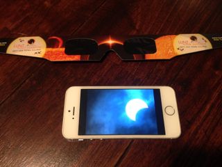 If you want to photograph the sun with your cell phone, consider putting a solar filter over the camera lens to protect the bright image of the sun from becoming burned into the screen.