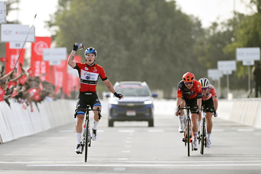 ABU DHABI, UNITED ARAB EMIRATES - FEBRUARY 07: Lorena Wiebes of Netherlands and Team SD Worx - Protime - Red Leader Jersey celebrates at finish line as stage winner ahead of Lily Williams of United States and Team Human Powered Health and Lara Gillespie of Ireland and UAE Team ADQ during the 3rd UAE Tour Women, Stage 2 a 111km stage from Al Dhafra Fort to Al Mirfa / #UCIWWT / on February 07, 2025 in Abu Dhabi, United Arab Emirates. (Photo by Tim de Waele/Getty Images)