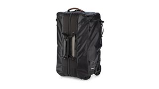 The Shimoda Roller bag features discreet, shock absorbent wheels.