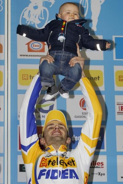 Rob Peeters with his daughter on the podium