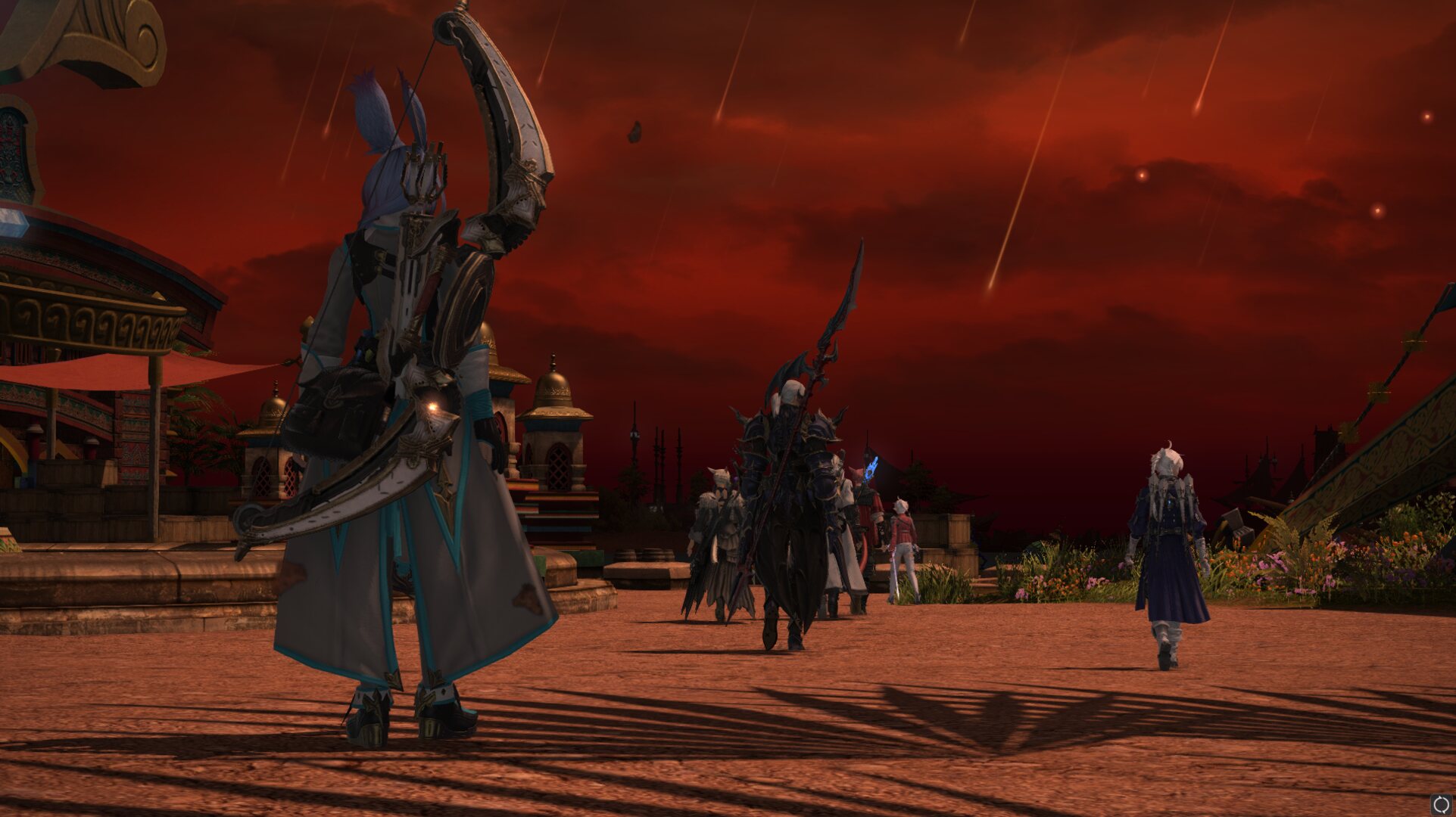 Charaktere, die in Final Fantasy XIV in den Himmel blicken, während er rot wird und das Herannahen der letzten Tage signalisiert