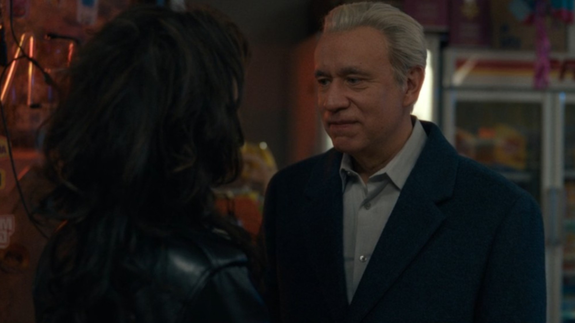 Fred Armisen and Poorna Jagannathan looking at each other in Deli Boys.