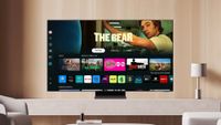 Samsung Tizen 9.0 on TV on stand in living room