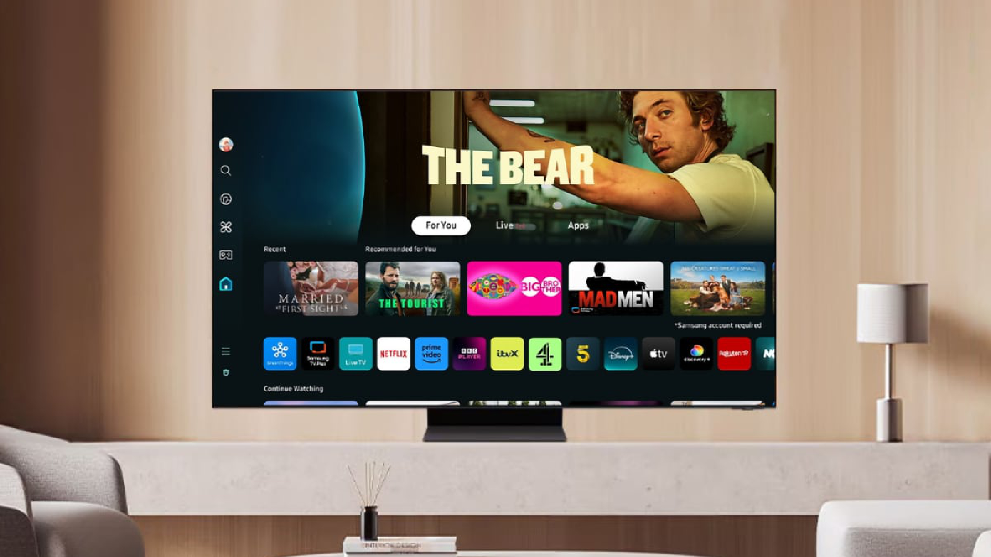 Samsung Tizen 9.0 on TV on stand in living room