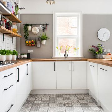 Kitchen makeover with brick island, grey patterned floor and white ...