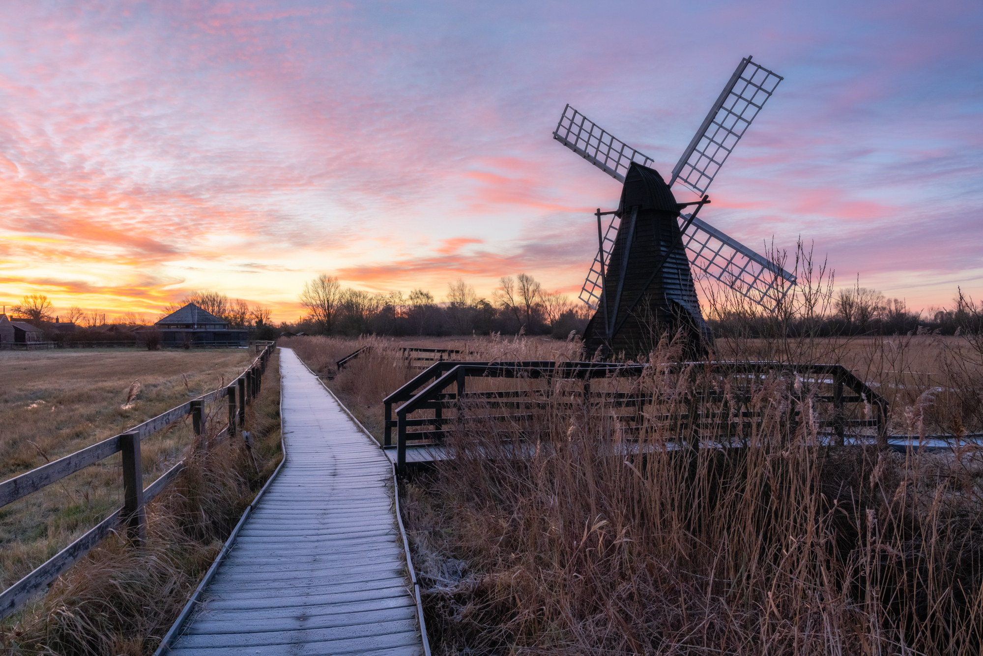 HDR bracketed composite at ISO 2500 of a windmill at golden hour