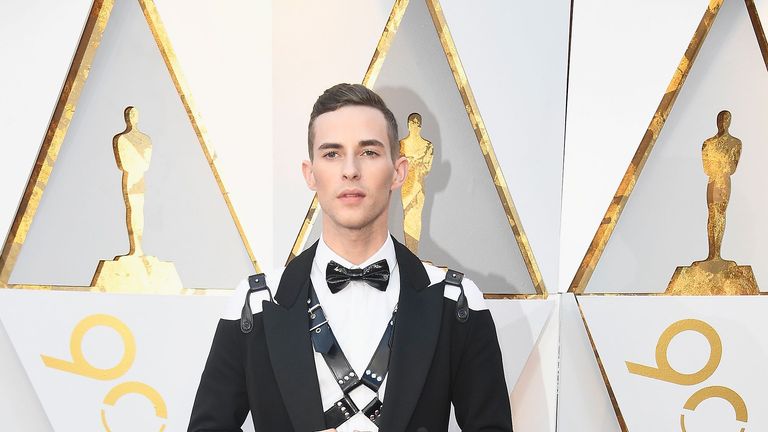 Red carpet, Carpet, Flooring, Suit, Formal wear, Tuxedo, Official,