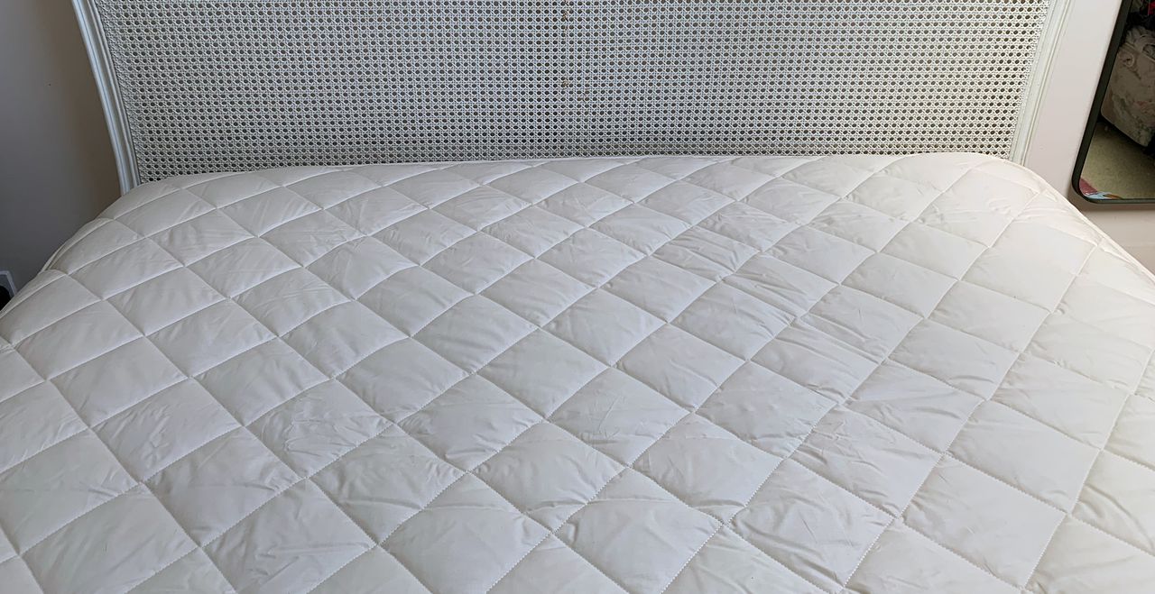 Woolroom Deluxe Washable Mattress protector on the bed