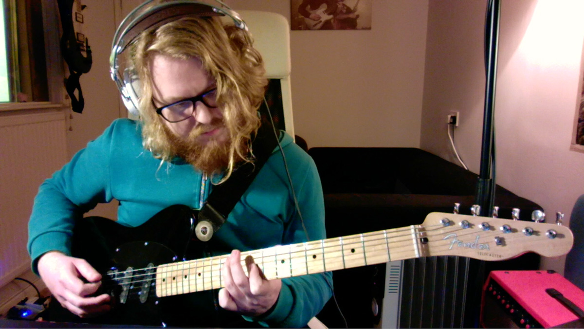Tom Peters of Alpha Male Tea Party plays a Fender Classic Player Triple Tele electric guitar