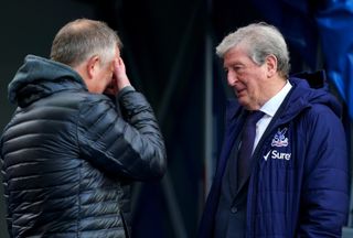 Chris Wilder, left, is consoled by Roy Hodgson after his side's 15th Premier League defeat of the season at Crystal Palace last Saturday