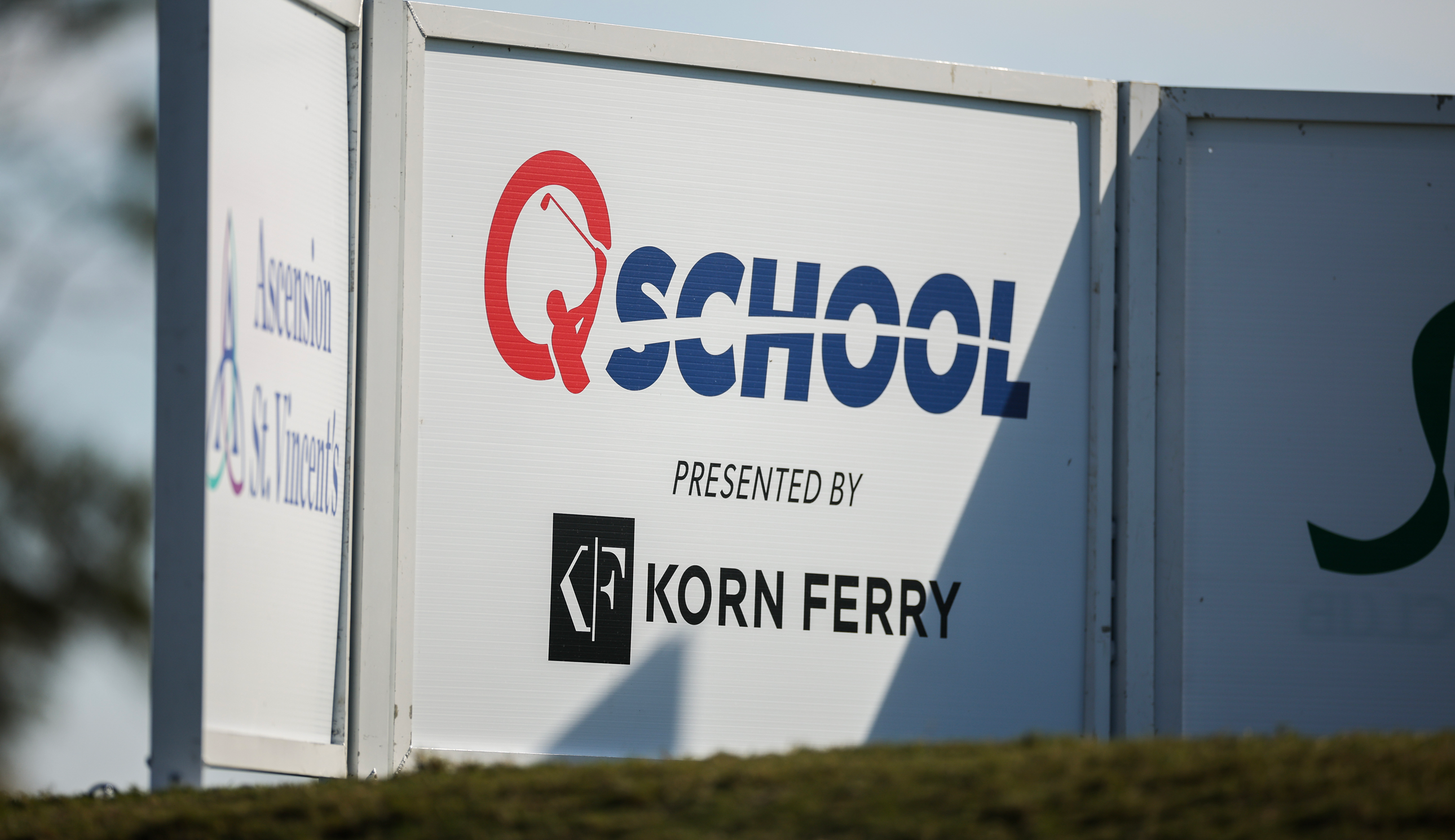 A PGA Tour Q-School board by the first tee