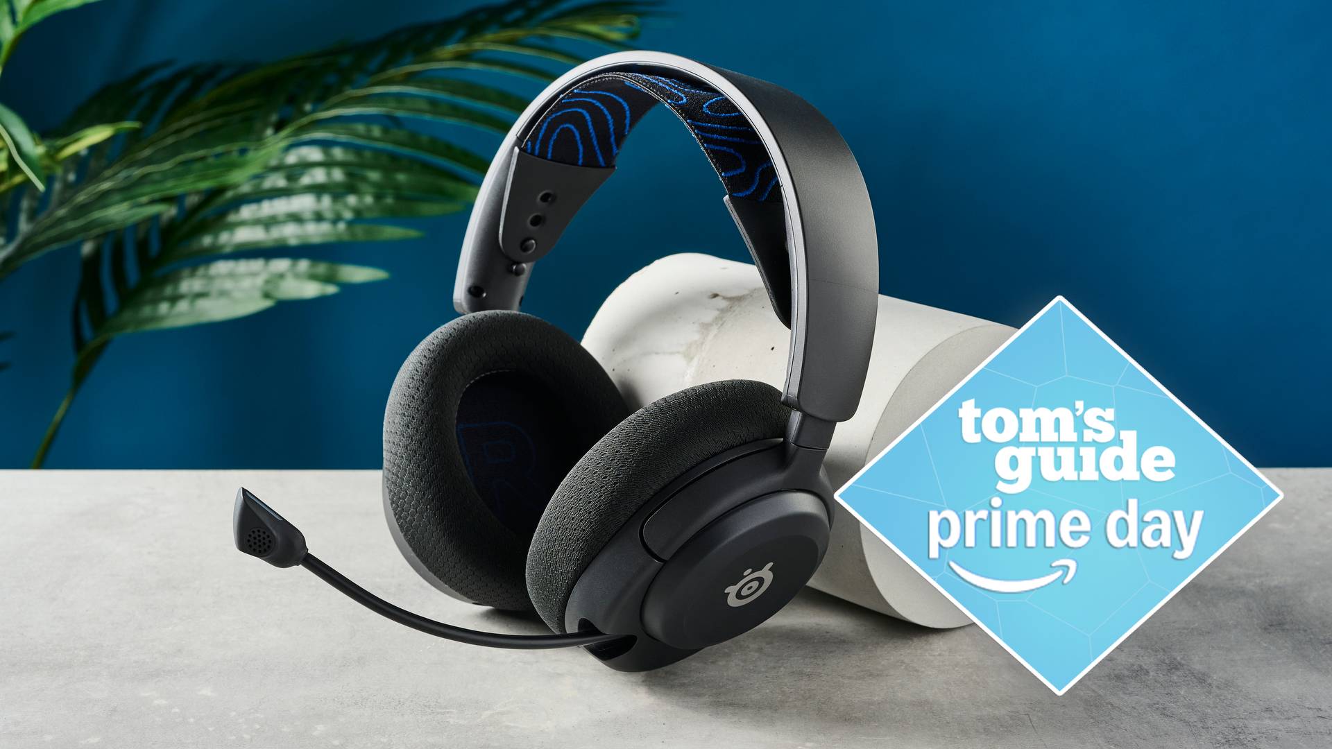 SteelSeries Arctis Nova 5P on table with Tom's Guide Prime Day badge