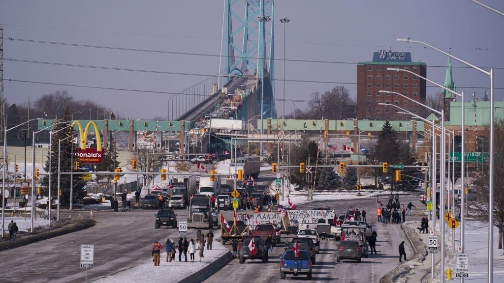 Truck drivers block a bridge in Canada.