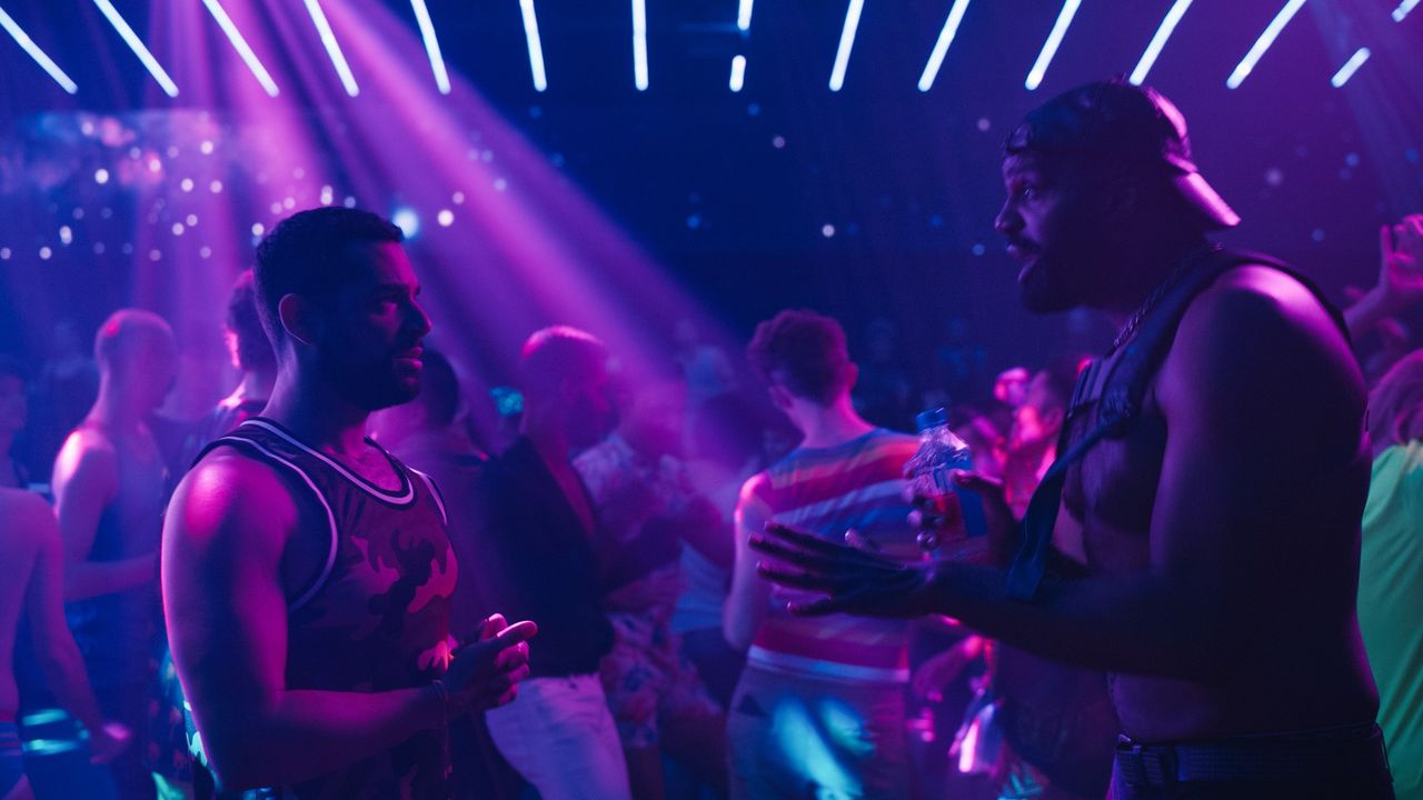 John Sibilly and Carl Clemson-Hopkins talk in a night club in Hacks