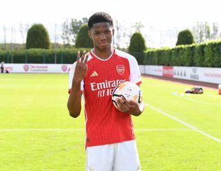 ST ALBANS, ENGLAND - SEPTEMBER 23: Chido Obi-Martin with the matchball after scoring a hat trick for Arsenal after the U18 Premier League match between Arsenal U18 and Southampton U18 at London Colney on September 23, 2023 in St Albans, England. (Photo by David Price/Arsenal FC via Getty Images) Manchester United target