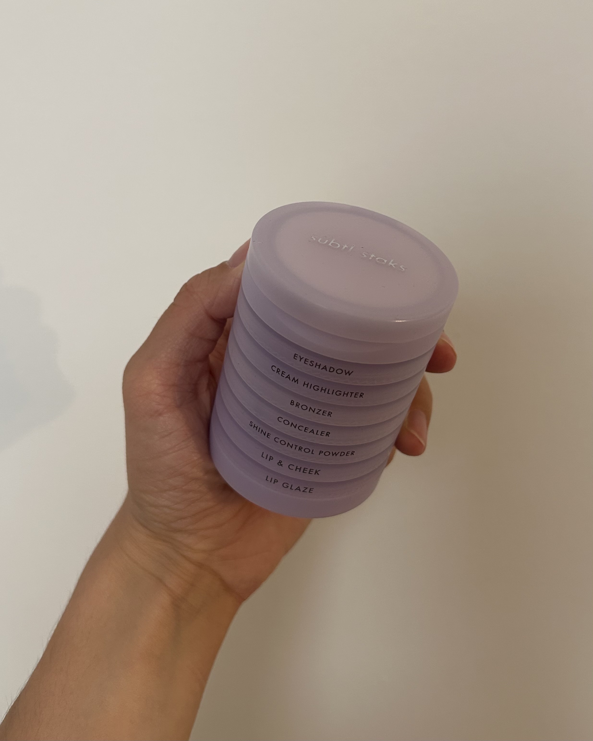 Alyssa Brascia holding the Subtl Beauty Stak.