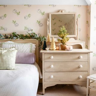 country style bedroom with floral wallpaper and upcycled dressing table