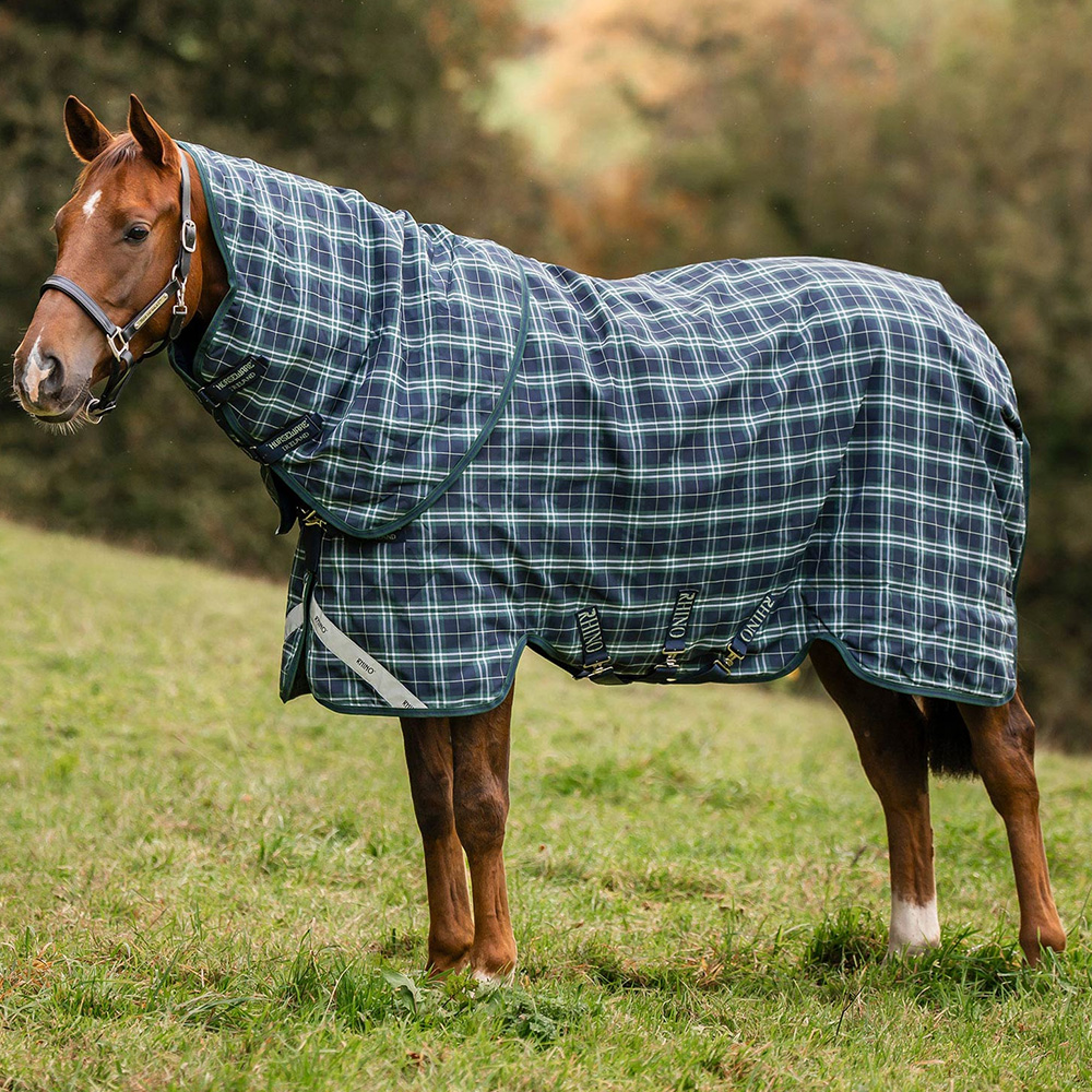 Side view of a horse wearing a Horseware Rhino Plus Turnout 0g rug