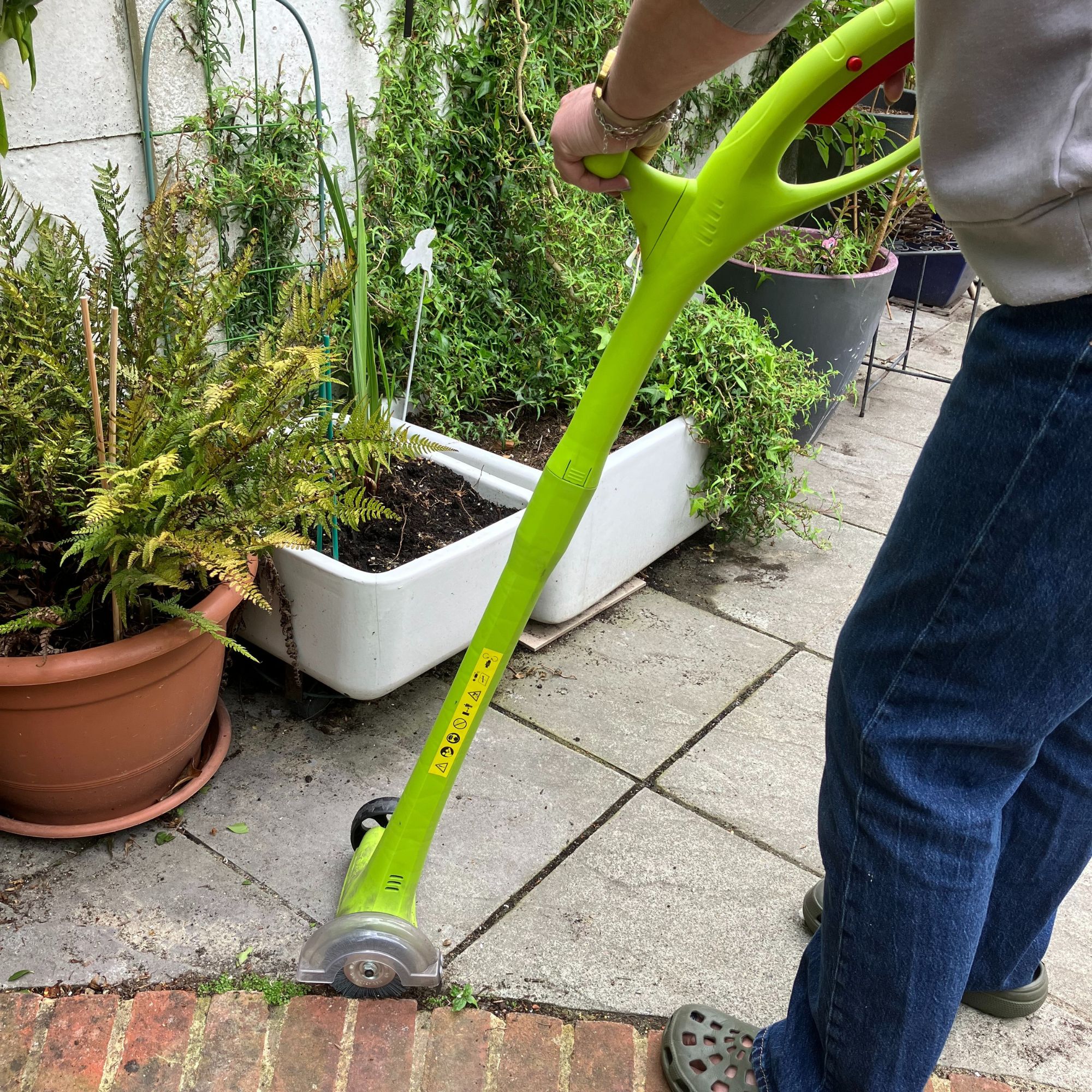 Weed Sweeper tool with paving edging
