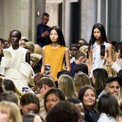 three models wearing pieces from JW Anderson on the Spring 2025 runway