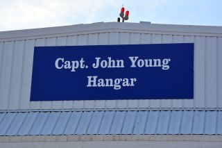 The newly revealed signing naming Hangar 276 at Ellington Field in Houston as the Capt. John Young Hangar.