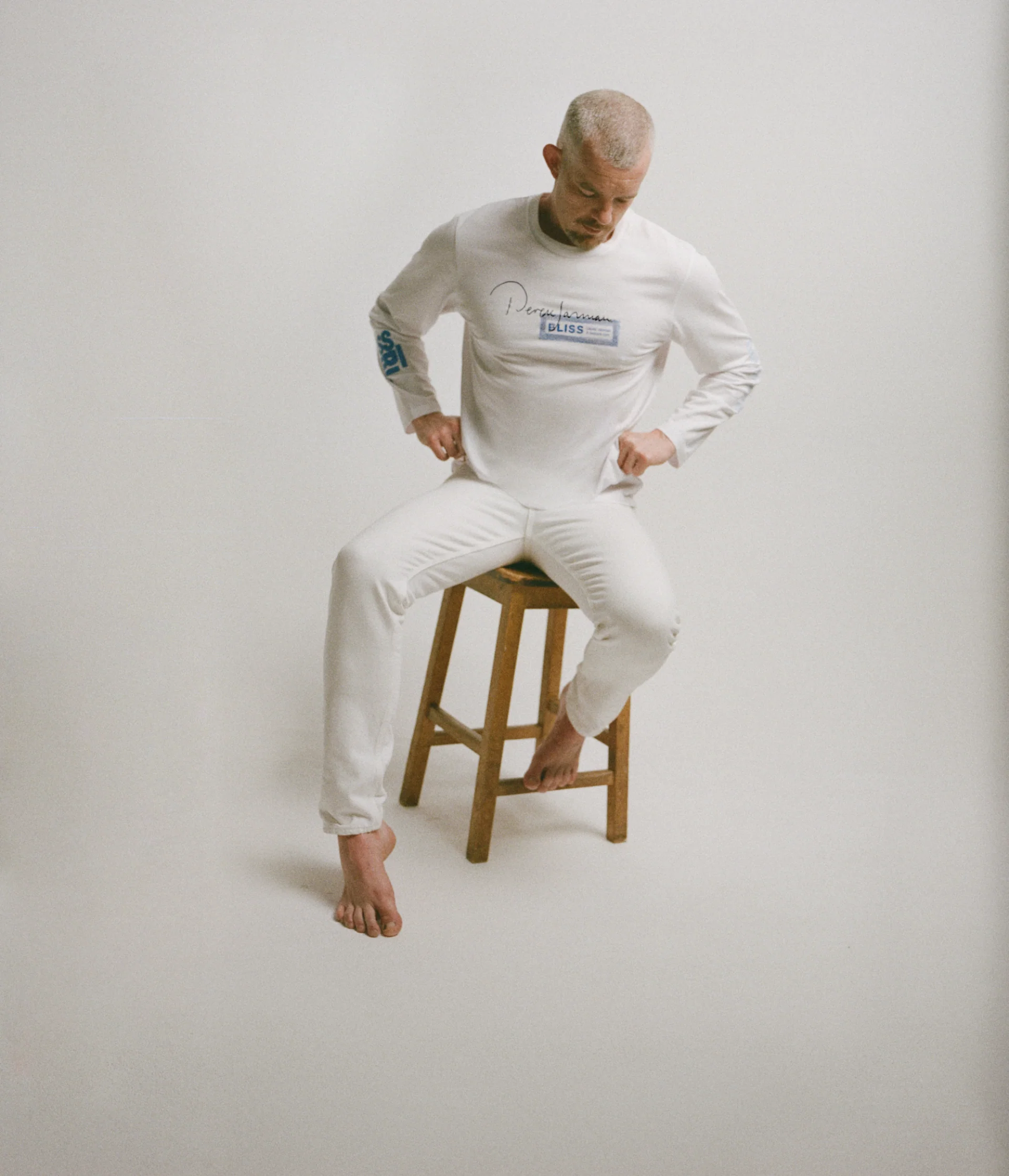 Actor Russell Tovey wearing the Erdem x Gay's the Word collab t-shirt featuring artwork by Derek Jarman