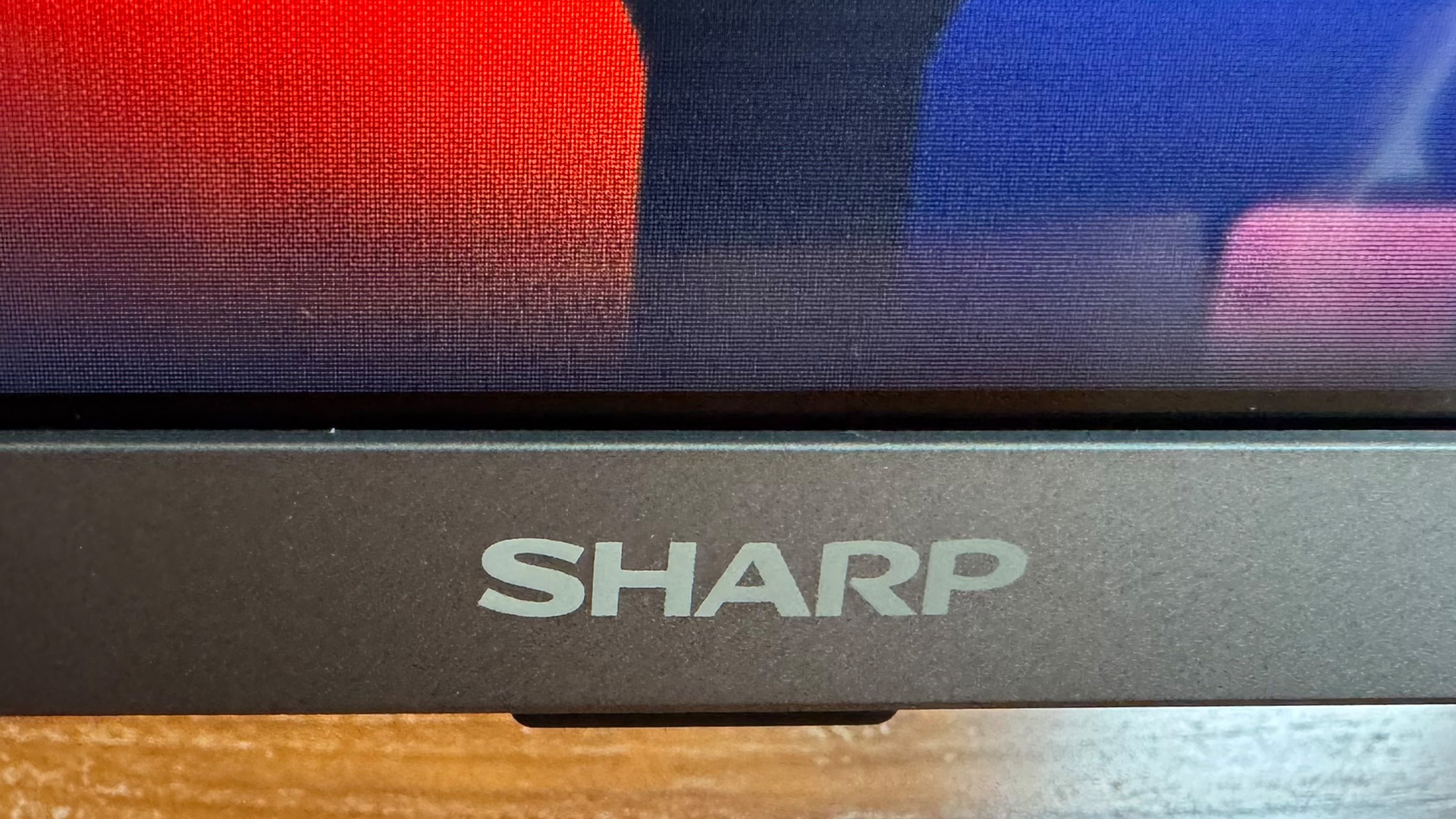 Sharp GM6245K 43-inch TV bottom of set showing Sharp logo