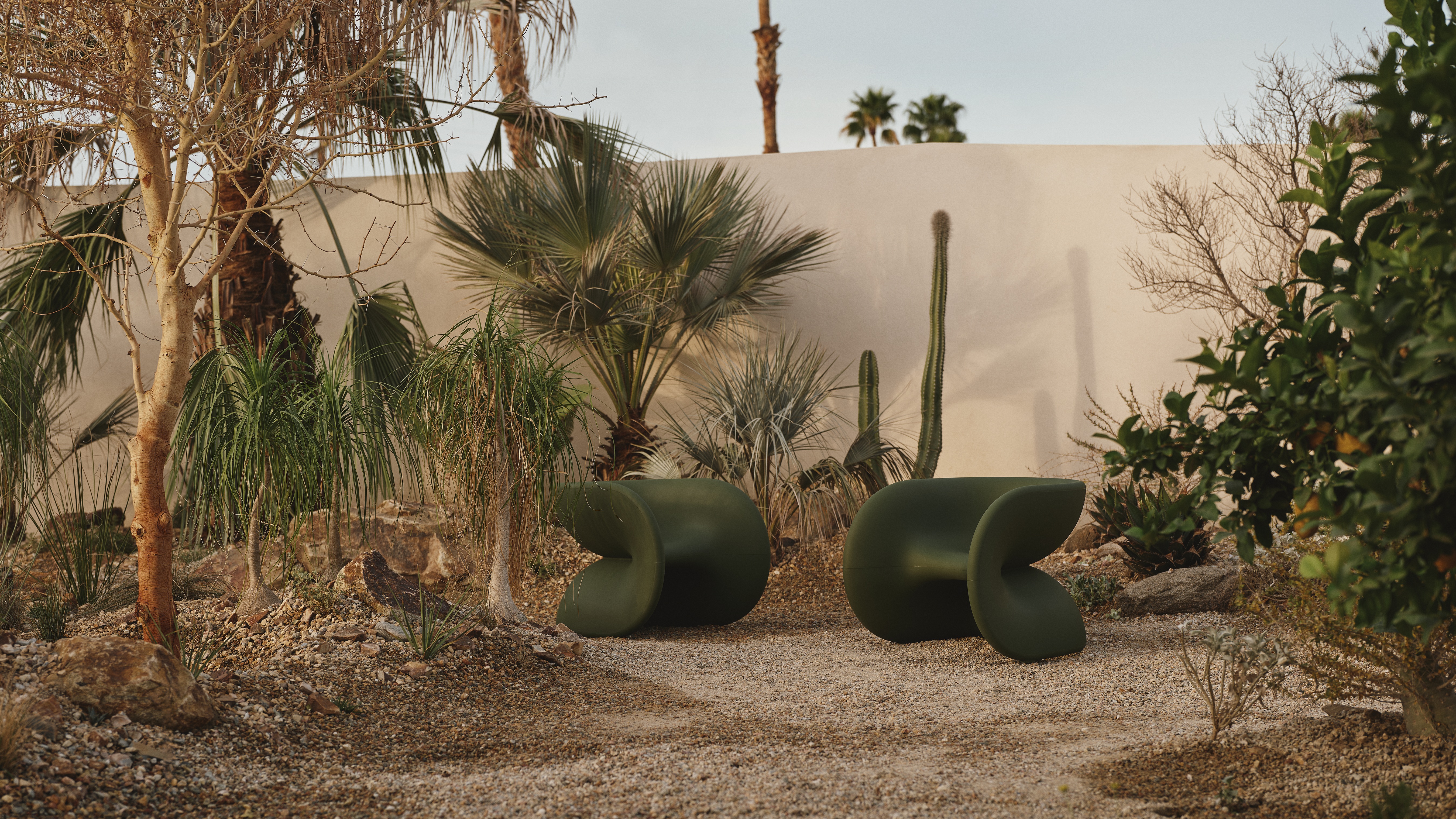 A Californian desert house from the mid 20th-century is furnished with earthy, stripy furnishings and iconic design pieces.