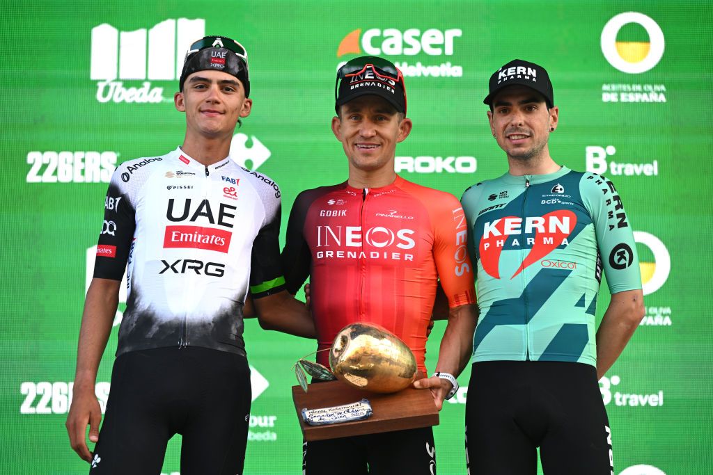 UBEDA SPAIN FEBRUARY 17 LR Isaac Del Toro of Mexico and UAE Team Emirates XRG on second place race winner Michal Kwiatkowski of Poland and Team INEOS Grenadiers and Ibon Ruiz of Spain and Team Equipo Kern Pharma on third place pose on the podium ceremony after the 4th Clasica Jaen Paraiso Interior 2025 a 1692km one day race from Ubeda to Ubeda on February 17 2025 in Ubeda Spain Photo by Tim de WaeleGetty Images