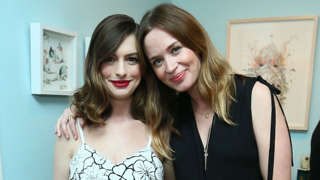 Anne Hathaway (L) and actress Emily Blunt attend Disney&#039;s Alice Through the Looking Glass event on May 12, 2016 at Roseark in Los Angeles California