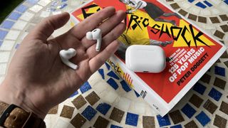 AirPods Pro 2 on a mosaic table