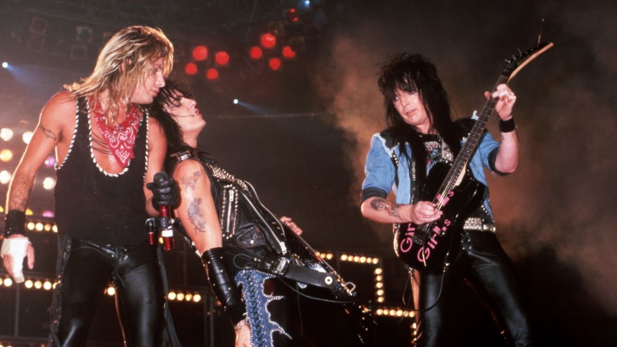 M&amp;ouml;tley Cr&amp;uuml;e lead singer Vince Neil, co-founder and bass player Nikki Sixx and guitarist Mick Mars perform onstage at the Joe Louis Arena, on J