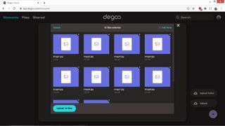 Degoo's web interface, with photos being uploaded