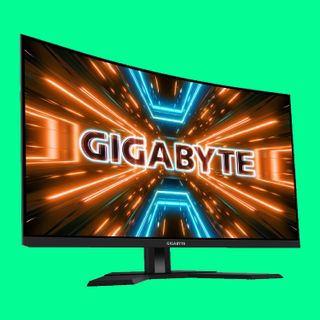 A picture of the Gigabyte M32UC on a green background